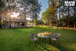 StayVista's Silver Grove - Serene Haven with Expansive Lawn & Terrace